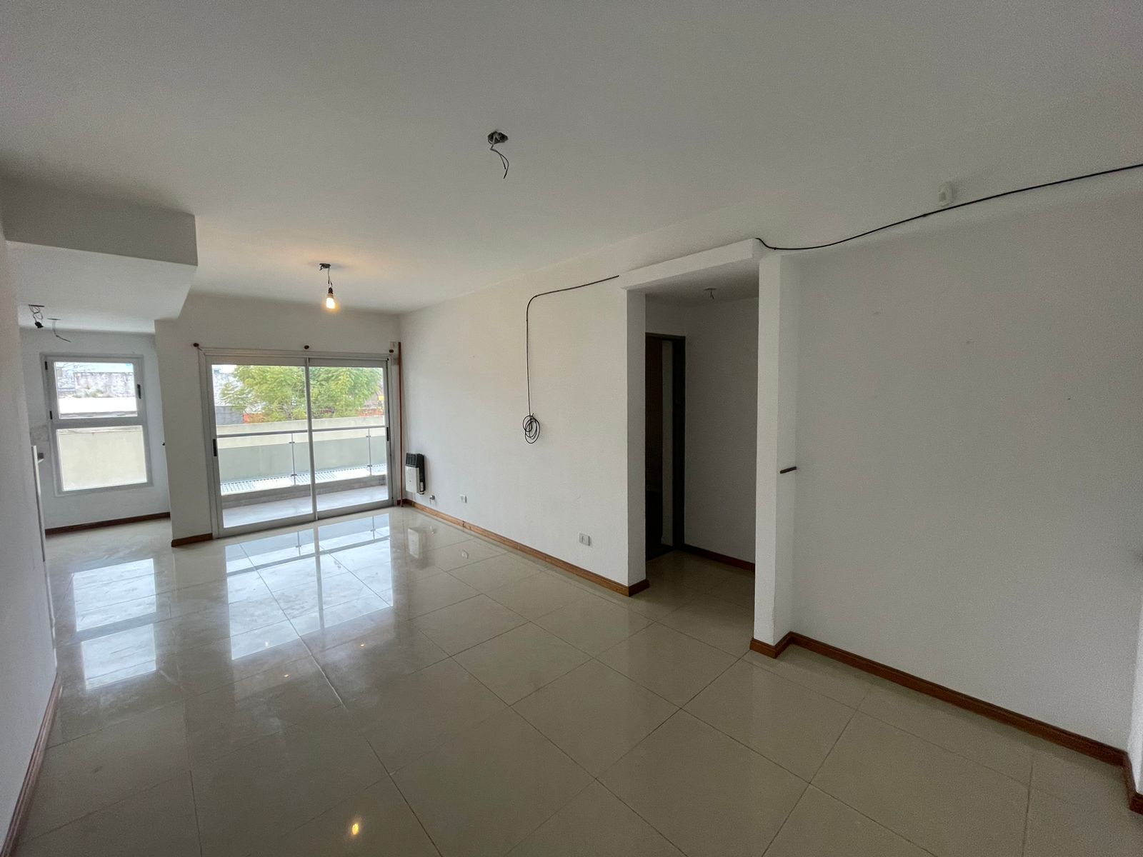 aparopropiedades - Departamento de 2 ambientes con cochera