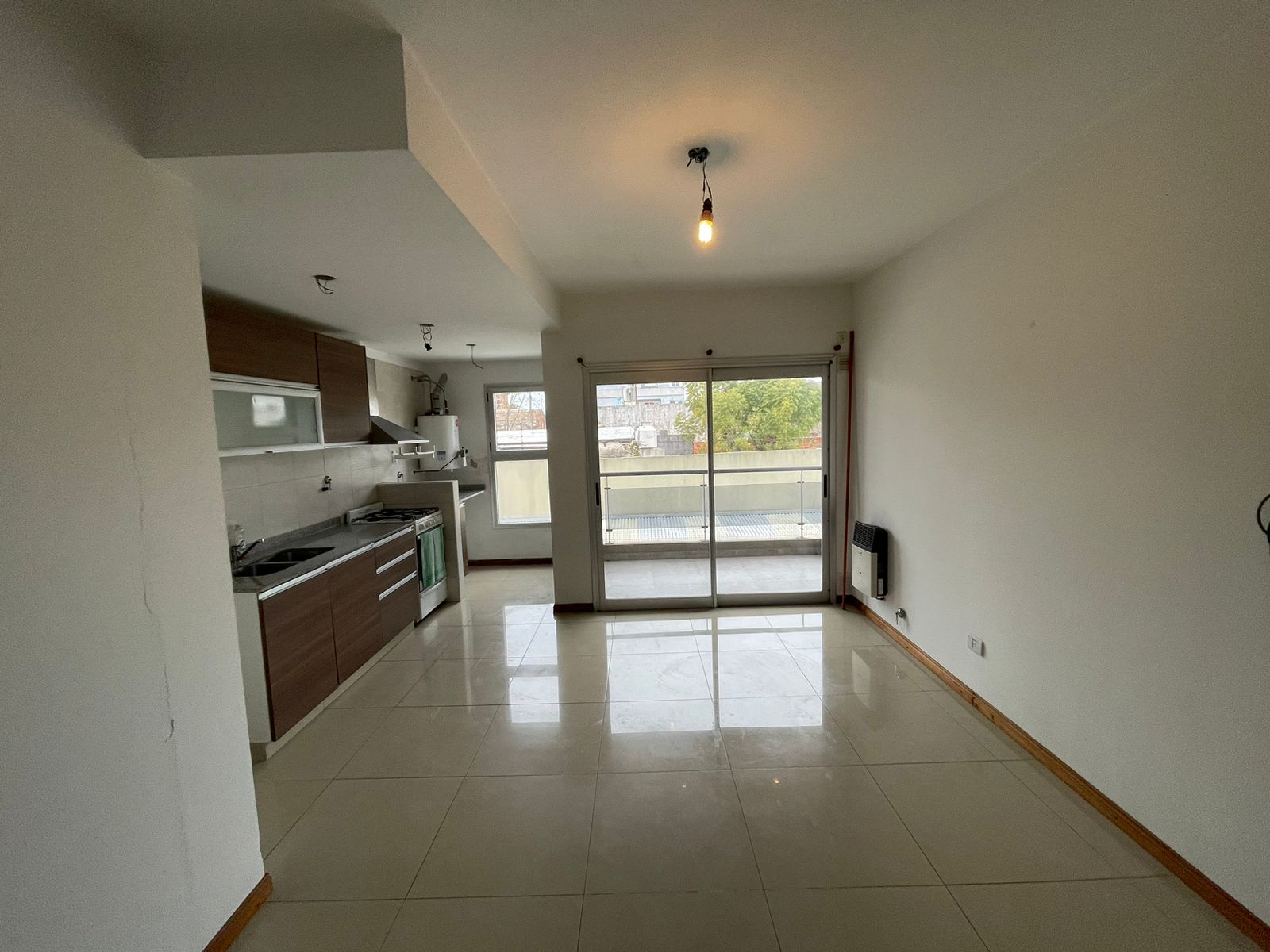 aparopropiedades - Departamento de 2 ambientes con cochera